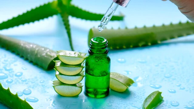 Oil and cosmetics with aloe vera extract. Selective focus.
