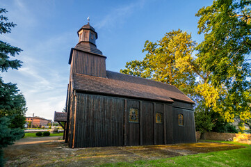 Wooden church of St. Marcin Bishop in Stara Wisniewka, Greater Poland Voivodeship, Poland - obrazy, fototapety, plakaty
