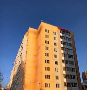 yellow residential tall building
