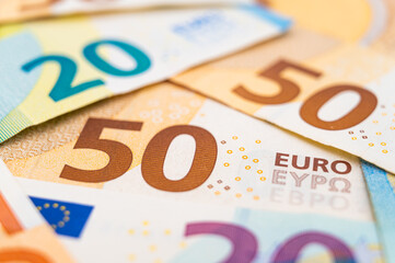 Banknotes of 20 and 50 euros arranged disorderly. Value for money.
