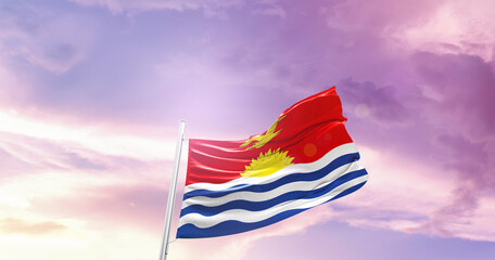 Waving Flag of Kiribati in Blue Sky. The symbol of the state on wavy cotton fabric.