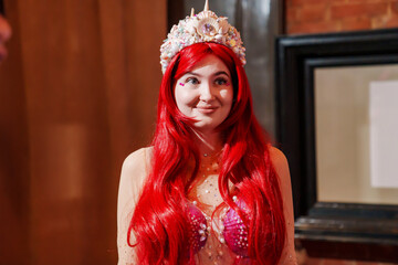 actors in costumes of a mermaid at a children's party. 