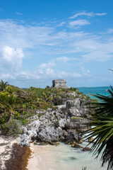 Coast at Tulum Mexico  with Mayan Building in distance - 577328999