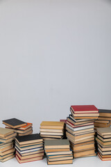 reading the science of knowledge many books stacked in a library on a white background