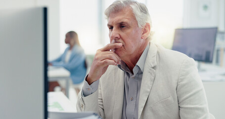 Fototapeta premium Stress, headache and senior businessman by computer reading sales email in office workplace. Mental health, burnout and tired elderly male employee with migraine, fatigue or depression from overwork.