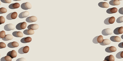 Neutral colorful Easter eggs beige brown color gradient on beige background, shadow at sunlight. Aesthetic flat lay from Chicken eggs, Easter holiday food banner, top view, minimal style