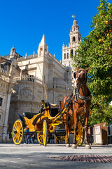 Naklejka na ściany i meble Horse carriage in the streets of Sevilla in Andalusia Spain