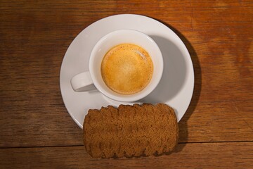 Espresso Coffee with a biscuit