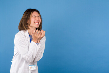 Young Chinese Scientist in Lab Coat: A Portrait of Exuberance and Triumph