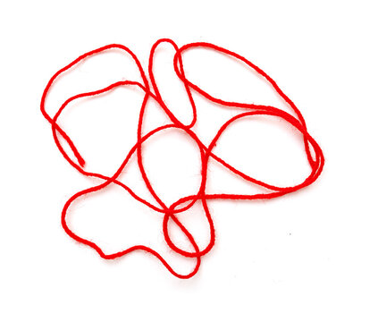 Red thread or rope with abstract twist shapes isolated on white