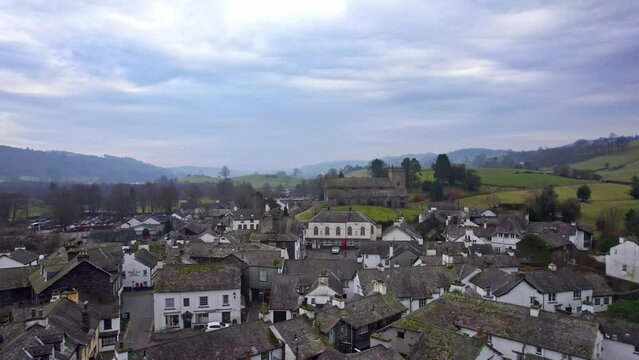 Drone, aerial footage of the historic village of Hawkshead a ancient town in the Lake District, Cumbria. The village is still the same collection of tiny houses, and squares