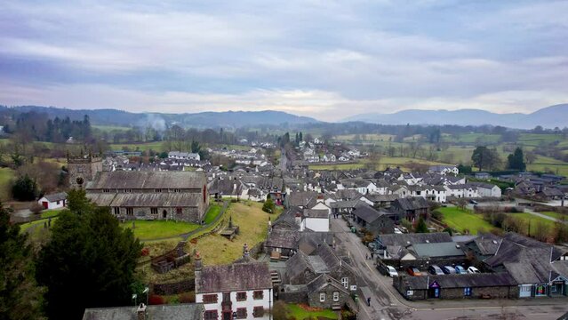 Drone, aerial footage of the historic village of Hawkshead a ancient town in the Lake District, Cumbria. The village is still the same collection of tiny houses, and squares