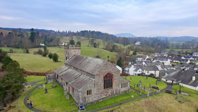 Drone, aerial footage of the historic village of Hawkshead a ancient town in the Lake District, Cumbria. The village is still the same collection of tiny houses, and squares