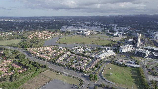 Driving Around Gated Community Houses By The Mudgeeraba Creek In The Town Of Robina In Queensland, Australia. wide aerial