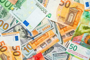 Obraz na płótnie Canvas Background щf money pile dollar and euro bills