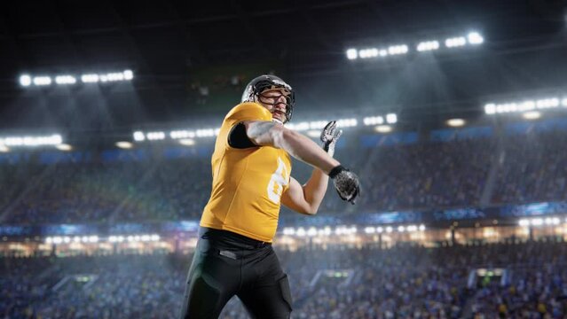 Aesthetic Shot of American Football Player Throwing a Ball on Big Stadium With Crowd Cheering. International Championship Match on Arena Full Of Fans. Super Slow Motion Captures Successful Pass.