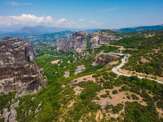 Obraz premium Aerial vIew The Holy Meteora Monasteries by drone. Summer Greece. Kalampaka. Kalabaka.