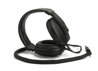 Black professional retro audio headphones from the 70s and 80s on a white background close up - 577362311