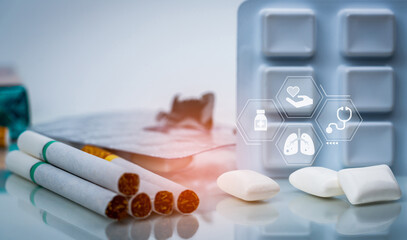 Quit smoking or smoking cessation with nicotine replacement therapy or NRT. 31 May World No Tobacco Day. Nicotine chewing gum in blister pack near pile of cigarettes. Nicotine products to stop smoke. - obrazy, fototapety, plakaty