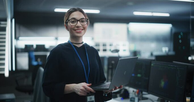 Portrait of an Attractive Empowered Multiethnic Woman Looking at Camera and Charmingly Smiling. Businesswoman at Work, Information Technology Manager, Software Engineering Professional