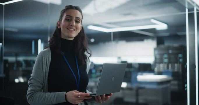 Portrait of a Young Attractive Empowered Multiethnic Woman Looking at Camera and Charmingly Smiling. Specialist at Work, Information Technology Manager, Software Engineering Professional