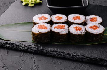 Japanese big maki sushi on black board