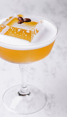 Orange and coffee cocktail in elegant glass