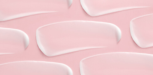 pattern cosmetic smears cream texture on pink background