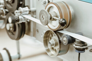 Machine for making metal blinds. Factory