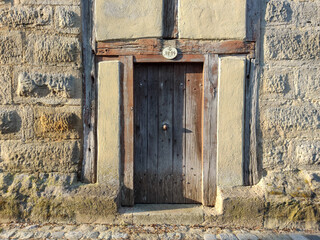The wooden door of the castle