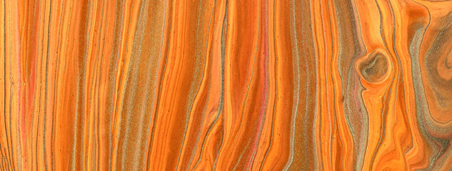 Abstract fluid art background bright orange and golden colors. Liquid marble. Acrylic painting with ginger gradient.
