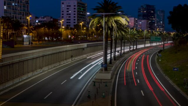 Panoramic view of urban traffic in Barcelona at dusk.Trail effect
Transit in the round of the littoral with the modern skyscrapers of the technology district 22@ on background.