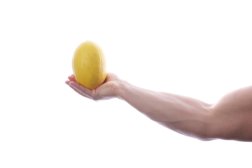 Strong fit muscular male holding a honeydew melon in his right hand transparent PNG