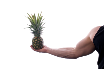 Strong fit muscular male holding a pineapple in his hand transparent PNG