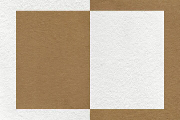 Texture of white and brown paper background with geometric shape and pattern, macro. Craft beige cardboard