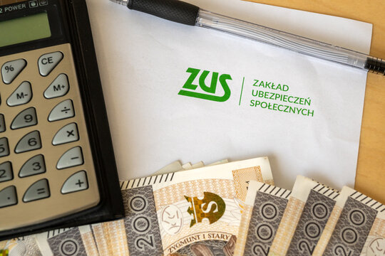 Gdansk, Poland - March 3, 2023: ZUS (National Social Insurance Company) logo on a sheet of paper and polish money