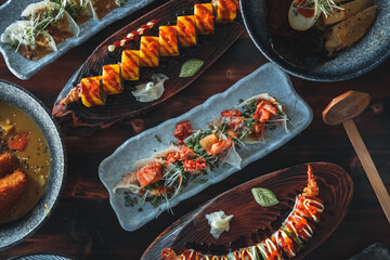 Savory Delights: A Top-Down View of Thai and Asian Cuisine. The colorful ingredients, intricate garnishes, and stunning presentation are a feast for the eyes 