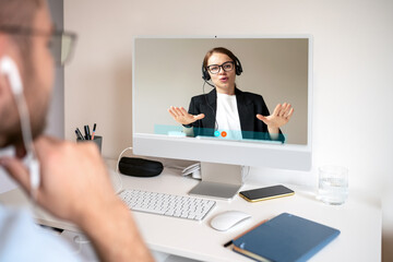 Psychological support online Man has video call meeting with his personal psychologist.