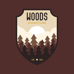 Woods logo vector design with trees nature landscape. Camping badge graphics in retro style. Travel colorful emblem. Stock vector adventure label