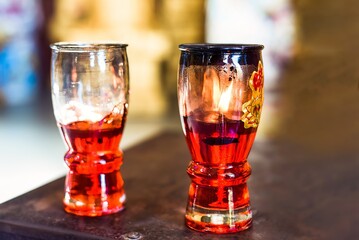 Religious oil for senko candles in Vietnamese Buddhist temple