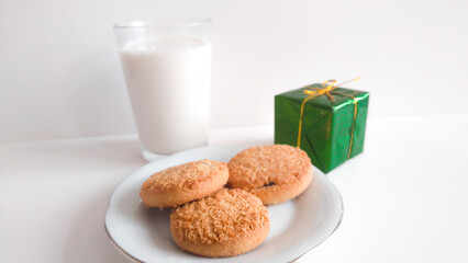 Milk and cookies for santa.
Present for santa.
Homemade cookies for santa.