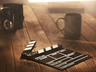 Movie clapperboard on the table