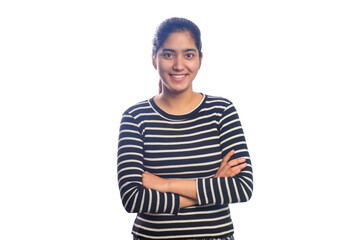 Fototapeta premium Teenage girl standing with arms crossed against white background
