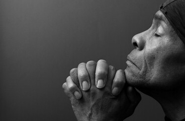 people praying to god at home on black background with people stock photo	