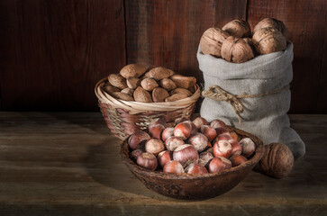 Walnuts on a dark wooden background