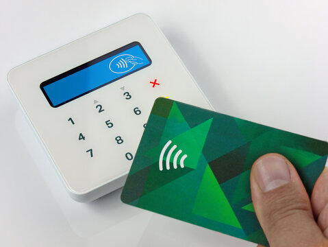 Closeup Contactless payment by credit or debit card succesful payment