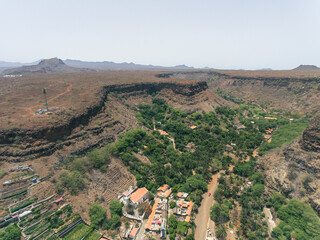 Aerial photos of Cidade Velha in Santiago, Cape Verde, reveal a historic town with a stunning coastline, a UNESCO World Heritage Site, showcasing colonial-era architecture, picturesque streets.