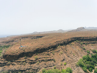 Aerial photos of Cidade Velha in Santiago, Cape Verde, reveal a historic town with a stunning coastline, a UNESCO World Heritage Site, showcasing colonial-era architecture, picturesque streets.
