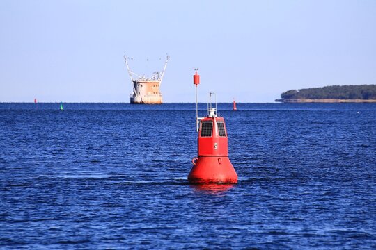 Red buoy in the Batlic Sea on a sunny day