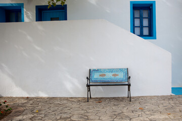 A chair on the street of Santorini